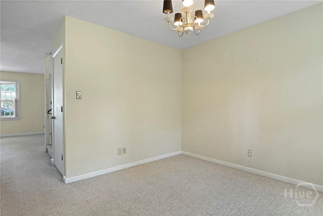 455 Mall Blvd Unit 39, Savannah, GA 31406 - unfurnished room with a chandelier and carpet