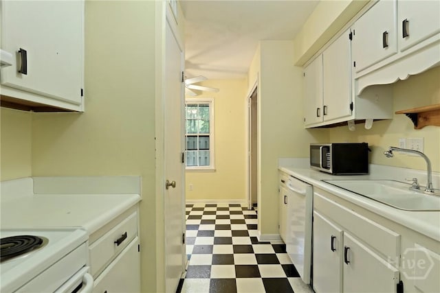 455 Mall Blvd Unit 39, Savannah, GA 31406 - kitchen featuring stainless steel microwave, dark flooring, white dishwasher, and light countertops