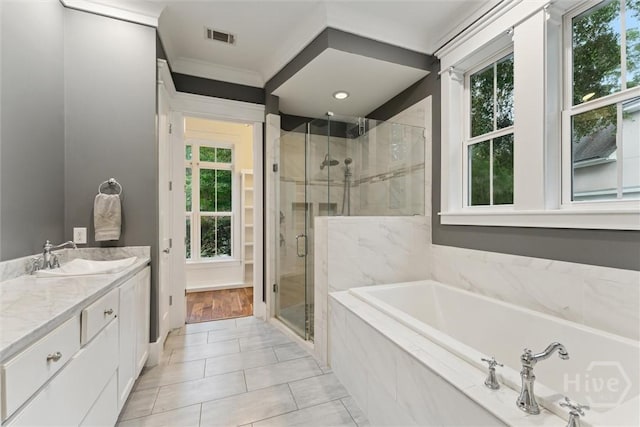 15 Sabal Dr, Richmond Hill, GA 31324 - bathroom featuring a bath, a stall shower, and vanity