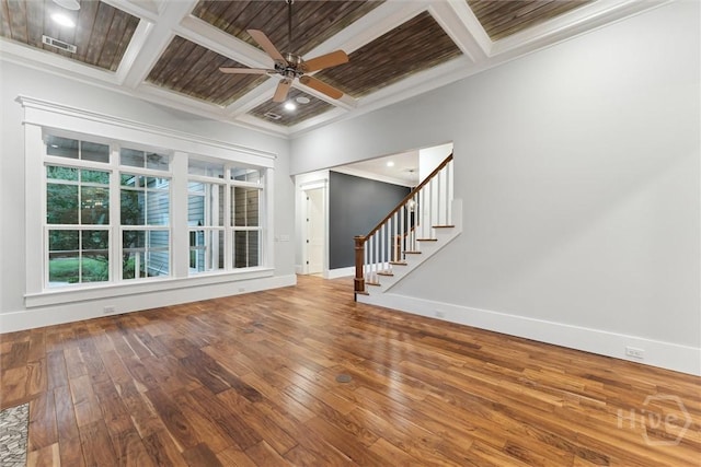 15 Sabal Dr, Richmond Hill, GA 31324 - spare room featuring coffered ceiling, hardwood / wood-style floors, a ceiling fan, crown molding, and stairway