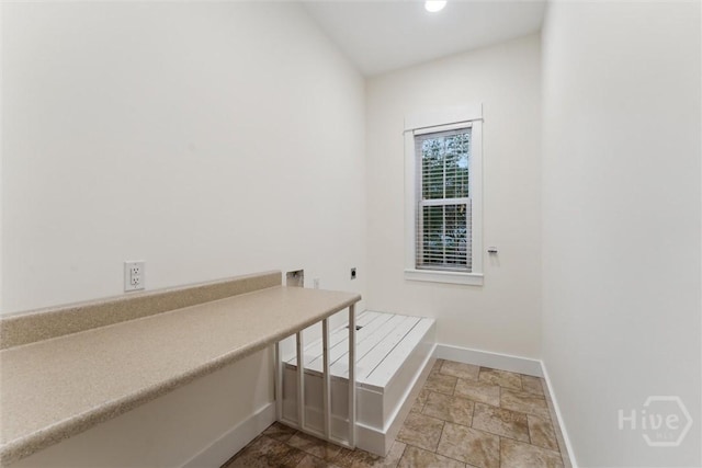 15 Sabal Dr, Richmond Hill, GA 31324 - laundry room with hookup for an electric dryer and stone finish floors