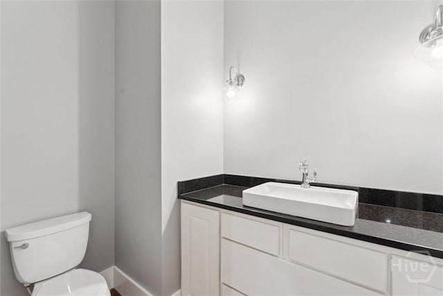 15 Sabal Dr, Richmond Hill, GA 31324 - half bathroom with toilet and vanity