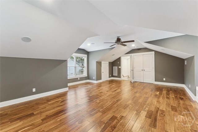 15 Sabal Dr, Richmond Hill, GA 31324 - bonus room with wood finished floors, vaulted ceiling, a ceiling fan, and recessed lighting