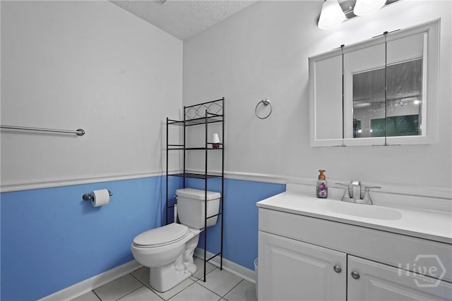 75 Brown Thrasher Ct, Richmond Hill, GA 31324 - bathroom featuring a textured ceiling, vanity, and tile patterned floors