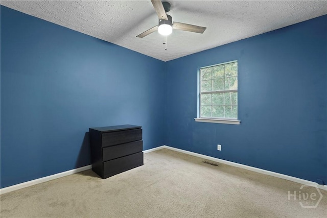 75 Brown Thrasher Ct, Richmond Hill, GA 31324 - carpeted spare room with a textured ceiling and a ceiling fan