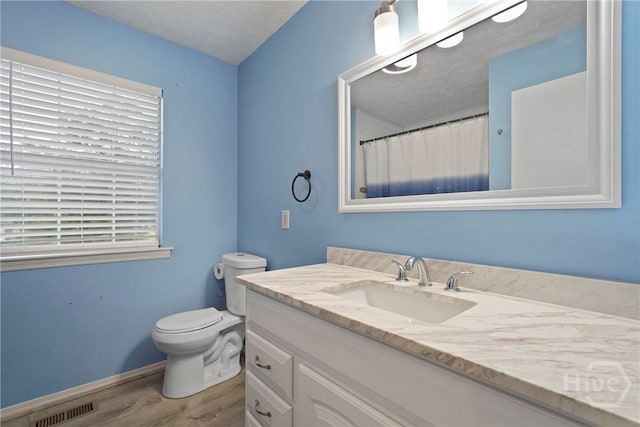 75 Brown Thrasher Ct, Richmond Hill, GA 31324 - full bath featuring wood finished floors and vanity