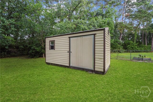 75 Brown Thrasher Ct, Richmond Hill, GA 31324 - view of shed featuring view of scattered trees