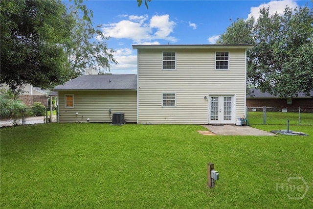 75 Brown Thrasher Ct, Richmond Hill, GA 31324 - rear view of property with french doors, a fenced backyard, a patio area, and a chimney