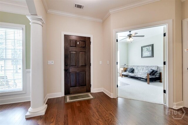 144 Sweetwater Cir, Rincon, GA 31326 - entryway featuring decorative columns, dark wood-style floors, healthy amount of natural light, and ornamental molding