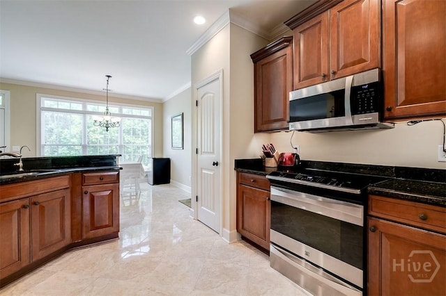 144 Sweetwater Cir, Rincon, GA 31326 - kitchen with stainless steel appliances, ornamental molding, dark stone counters, brown cabinets, and hanging light fixtures