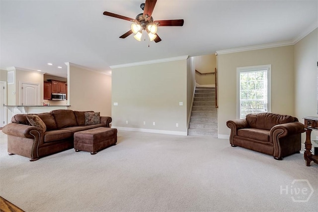 144 Sweetwater Cir, Rincon, GA 31326 - living area with crown molding, stairs, ceiling fan, light colored carpet, and recessed lighting