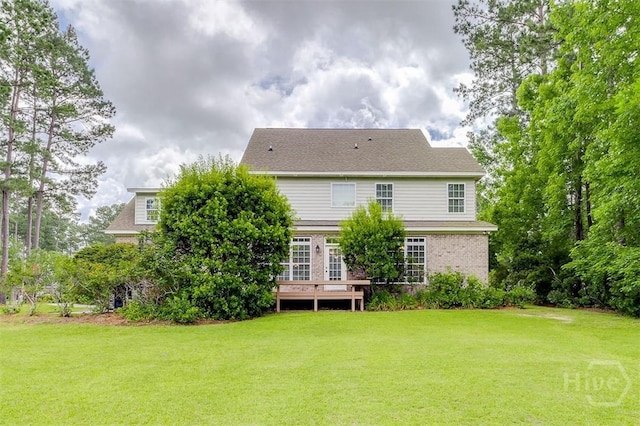 144 Sweetwater Cir, Rincon, GA 31326 - back of property with a lawn and a deck