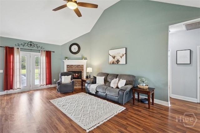 112 Kingsley Dr N, Guyton, GA 31312 - living area with a ceiling fan, a fireplace, high vaulted ceiling, and dark wood-style floors