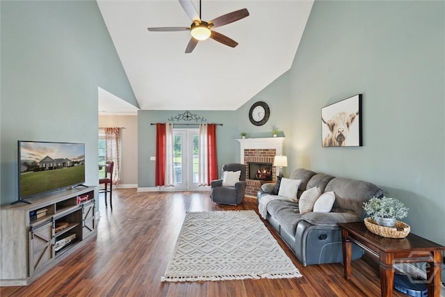 112 Kingsley Dr N, Guyton, GA 31312 - living room featuring high vaulted ceiling, ceiling fan, wood finished floors, and a fireplace