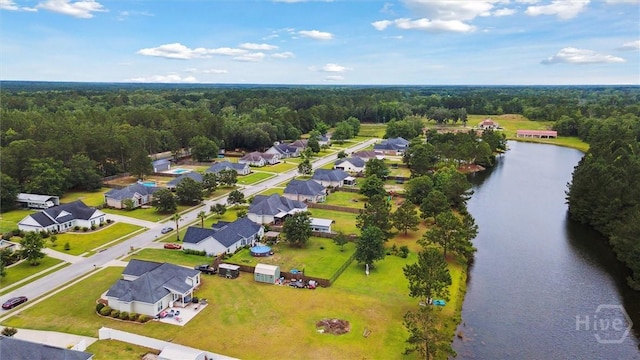 112 Kingsley Dr N, Guyton, GA 31312 - aerial view of residential area featuring a large body of water and a heavily wooded area