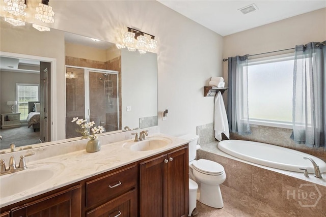 112 Kingsley Dr N, Guyton, GA 31312 - ensuite bathroom featuring a stall shower, a bath, a chandelier, double vanity, and tile patterned floors
