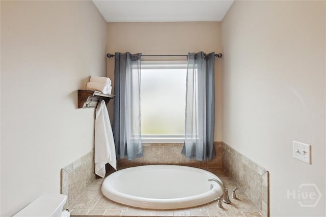 112 Kingsley Dr N, Guyton, GA 31312 - bathroom with a bath and toilet