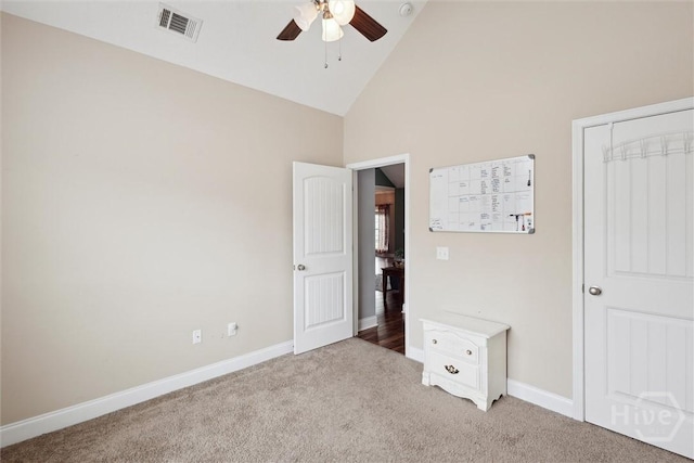 112 Kingsley Dr N, Guyton, GA 31312 - unfurnished bedroom with high vaulted ceiling, light carpet, and a ceiling fan