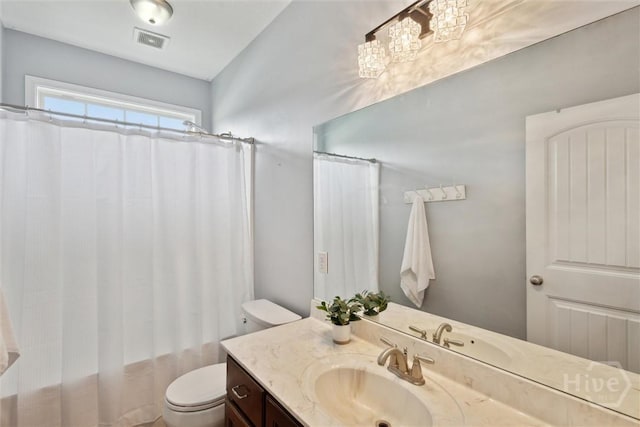 112 Kingsley Dr N, Guyton, GA 31312 - bathroom featuring vanity and a chandelier