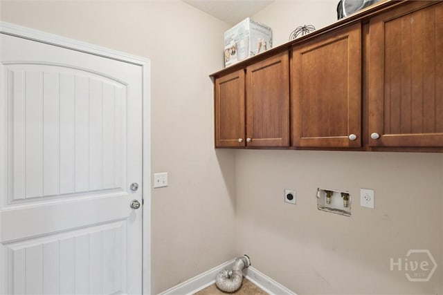 112 Kingsley Dr N, Guyton, GA 31312 - washroom featuring cabinet space, electric dryer hookup, and hookup for a washing machine