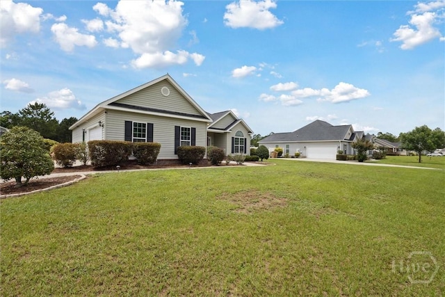 112 Kingsley Dr N, Guyton, GA 31312 - ranch-style home with a garage and a front lawn