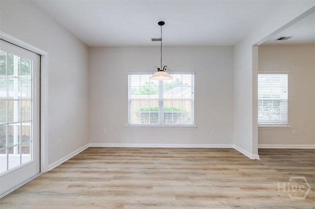 7 Hartland Ct, Savannah, GA 31407 - unfurnished dining area featuring light wood finished floors
