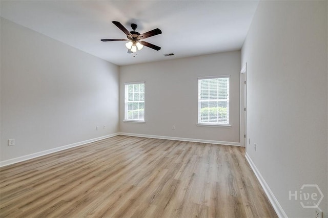 7 Hartland Ct, Savannah, GA 31407 - spare room featuring plenty of natural light, light wood-type flooring, and a ceiling fan