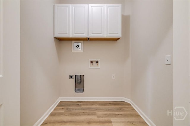 7 Hartland Ct, Savannah, GA 31407 - laundry area featuring light wood finished floors, washer hookup, cabinet space, and hookup for an electric dryer