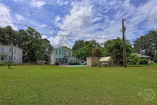 206 Bonaventure Rd, Thunderbolt, GA 31404 - view of grassy yard with an outdoor structure
