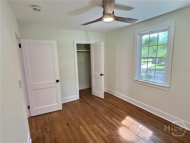417 E 65th St, Savannah, GA 31405 - unfurnished bedroom with wood finished floors, a closet, and a ceiling fan