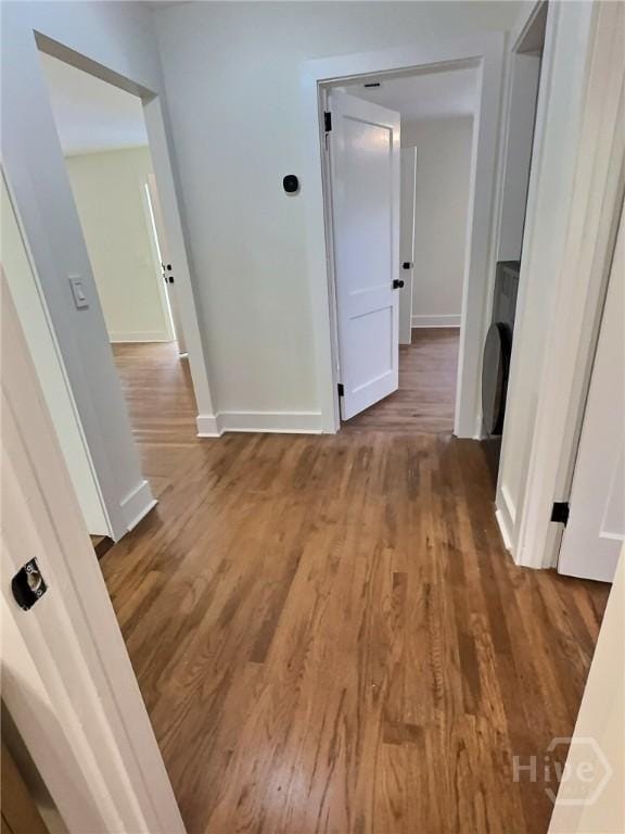 417 E 65th St, Savannah, GA 31405 - hallway featuring wood finished floors and baseboards