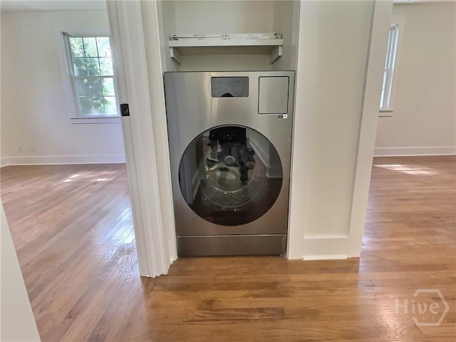 417 E 65th St, Savannah, GA 31405 - washroom with washer / clothes dryer and wood finished floors