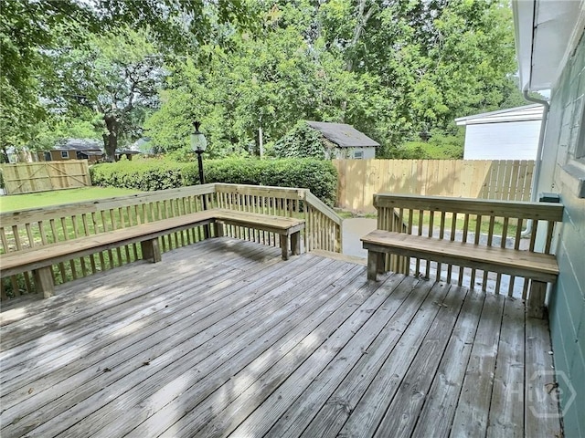 417 E 65th St, Savannah, GA 31405 - wooden terrace featuring a fenced backyard