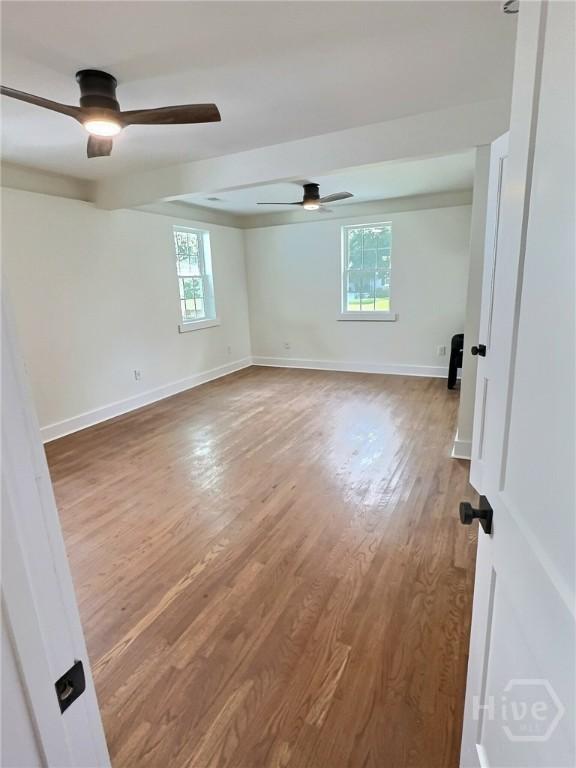 417 E 65th St, Savannah, GA 31405 - unfurnished room featuring a ceiling fan and wood finished floors