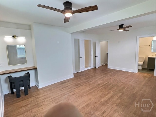 417 E 65th St, Savannah, GA 31405 - unfurnished living room featuring ceiling fan and light wood finished floors