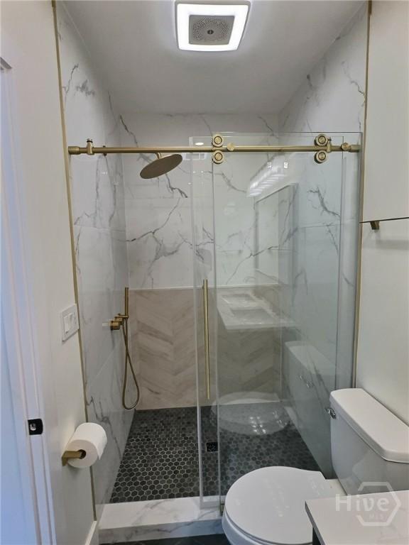 417 E 65th St, Savannah, GA 31405 - full bath featuring a marble finish shower and vanity