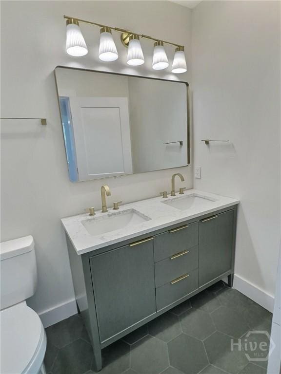 417 E 65th St, Savannah, GA 31405 - bathroom with double vanity and tile patterned flooring