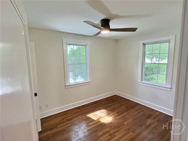 417 E 65th St, Savannah, GA 31405 - empty room featuring plenty of natural light, ceiling fan, and dark wood finished floors