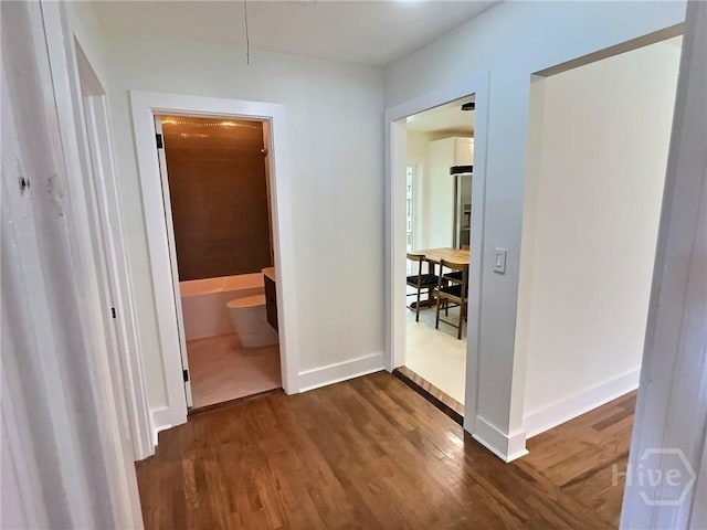 417 E 65th St, Savannah, GA 31405 - hall featuring dark wood finished floors and baseboards