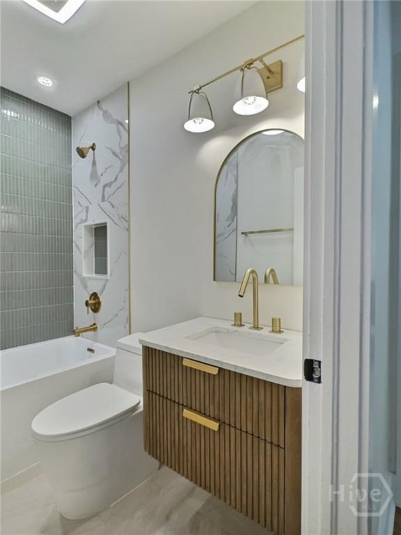 417 E 65th St, Savannah, GA 31405 - bathroom with vanity and shower / bath combination
