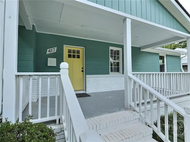 417 E 65th St, Savannah, GA 31405 - property entrance featuring covered porch