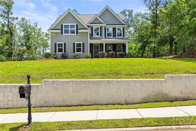136 Ramsey Way, Rincon, GA 31326 - view of front of property with a front yard and a porch