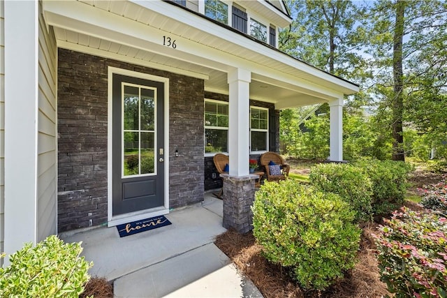 136 Ramsey Way, Rincon, GA 31326 - property entrance featuring a porch