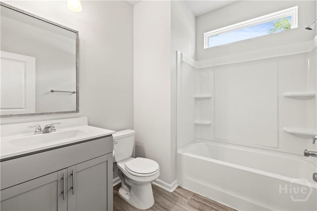 136 Ramsey Way, Rincon, GA 31326 - full bathroom featuring vanity, shower / tub combination, and wood finished floors