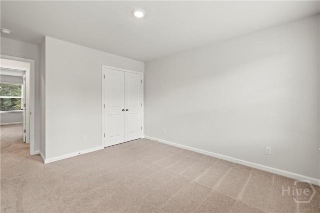 136 Ramsey Way, Rincon, GA 31326 - unfurnished bedroom featuring carpet, a closet, and recessed lighting