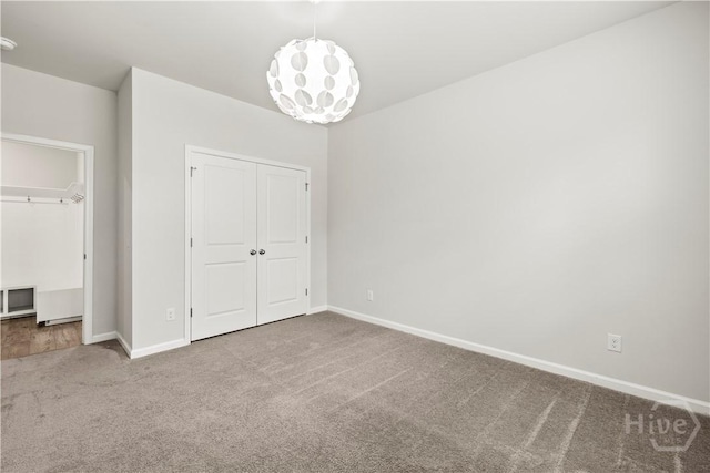 136 Ramsey Way, Rincon, GA 31326 - unfurnished bedroom with carpet and a closet