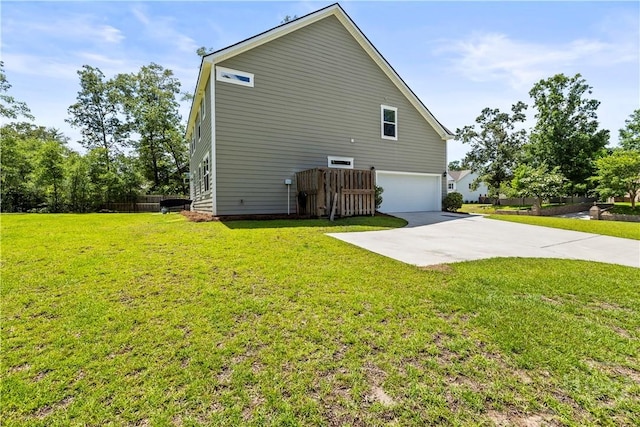 136 Ramsey Way, Rincon, GA 31326 - view of property exterior with an attached garage, driveway, and a lawn
