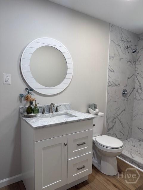 12 Jaguar Ln, Savannah, GA 31419 - bathroom with wood finished floors, a marble finish shower, and vanity