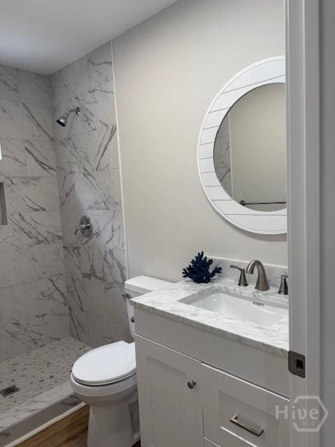 12 Jaguar Ln, Savannah, GA 31419 - full bath featuring vanity, a marble finish shower, and wood finished floors