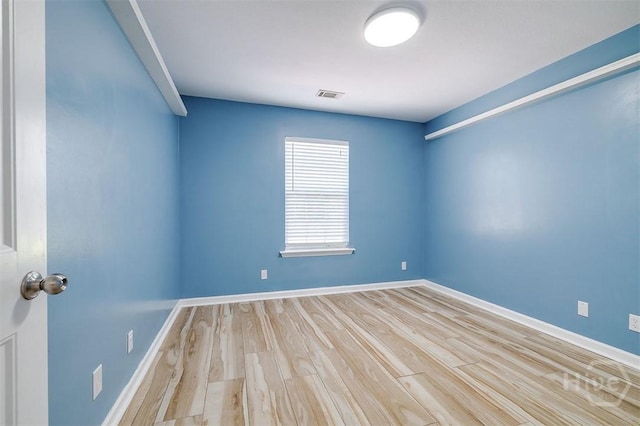 140 Abigail Cir, Ellabell, GA 31308 - spare room with wood finished floors and baseboards